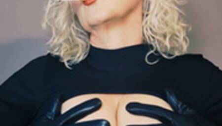SmokerQueenJoan smokes dominant and divine her Marlboro Red 100*leathergloves*cut out top*sexy clevage*