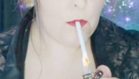 Nicki Pie smokes VS120s and masturbates