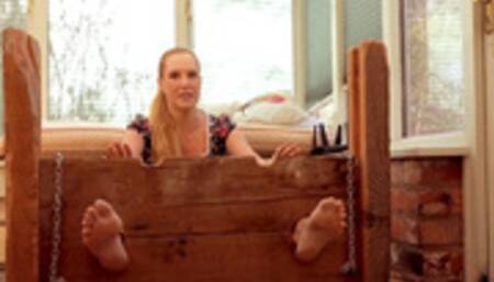 Barefoot and Humiliated in the Stocks