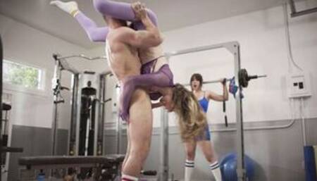 Shemale fucks muscled stud in the gym