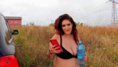 Fat brunette pee outdoor and she piss next the wheel of the car