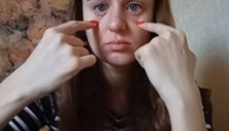 Touching the fingernails of the eyeball