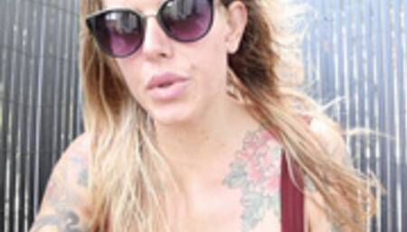 Cigarette Smoking on The Balcony In Sunglasses