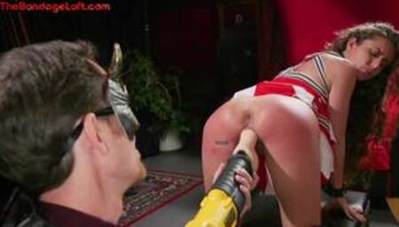 BDSM cheerleader fucked with machine in public for voyeurs