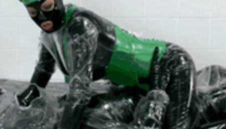 Black rubber couple wrapped in plastic coats - Part 2 of 2 - Riding on hard cock