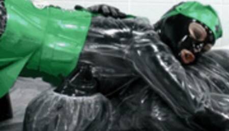 Black rubber couple wrapped in plastic coats - Part 1 of 2 - Blowjob and Piss mania