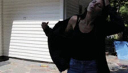 Sprayed to Strip: Cali complains through her ball gag after being hosed down, stripped nude and handcuffed