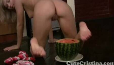 Cute Christina squashing watermelon