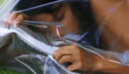 Hot brunette masturbates outdoor in lubed plastic bag