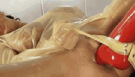 Kinky girl bondaged in rubber straightjacket - Part 2 of 2 - The foot fuck