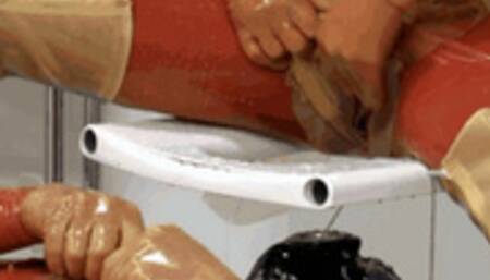 Latex goddess and her rubber plug head slave - Part 1 of 2 - Piss me on and give me blowjob please