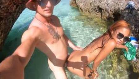 Asian European amateur couple enjoying public sex on a deserted island