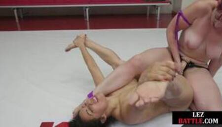 Wrestling lezdom winner fucks loser in pussy with strapon