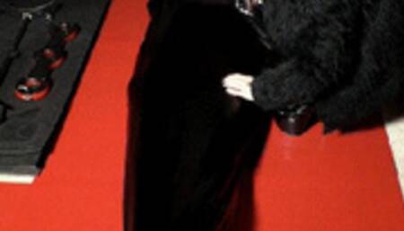 Cbt with extreme high heels and wartenberg pinwheel on a slave totally encased in bondage sack WMV version