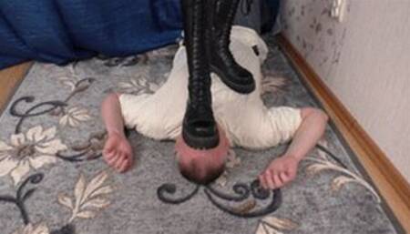 Slender teen girl dominates man with Doc Martens boots near wall, vf2590x 1080p