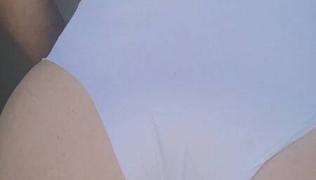 Naughty ballerina at her kitchen