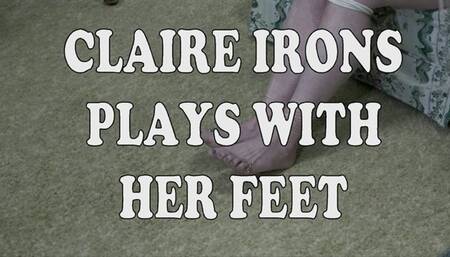 CLAIRE IRONS PLAYS WITH HER FEET