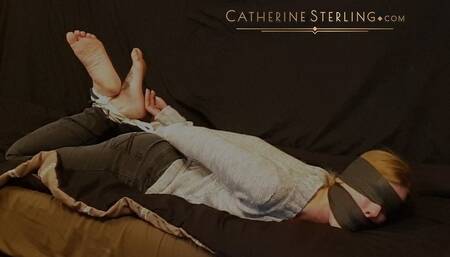 0065 Sweater Bondage, Blindfold & a One Rope Hogtie keeps Petite Blond Catherine Sterling Occupied in the Office! Mobile Version