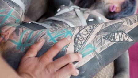 Slutty inked girl gets two hard cocks in pussy at once