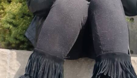 smoking outside and crushing cigarette