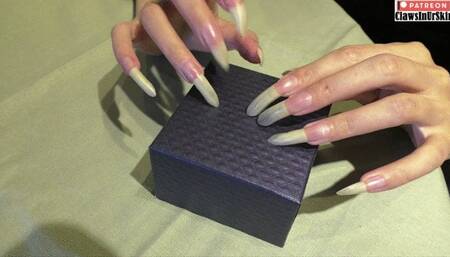 Long nails scratching and ruining the box