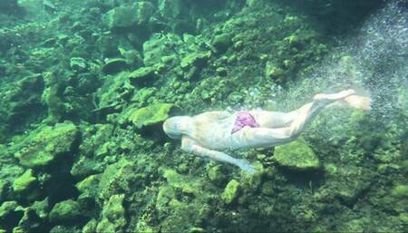 Liz doing an underwater tricks in a Cenote in Mexico!