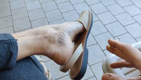 Foot tickling while dangling with Menorcan sandals