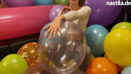 crushing balloons with a giant ball