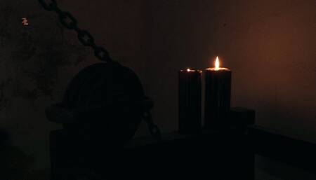 Pretty maid hanging headover on only one leg to be whipped