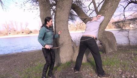 OUTDOORS SLAVE TRAINING - AT THE RIVER - HARD SPANKING WITH A HARD STICK REMASTERED