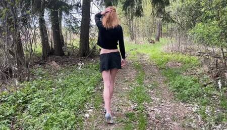 a girl in expensive high-heeled shoes with Swarovski crystals walks through the mud, her shoes sink into the mud, then she walks along the road in them and later takes them off