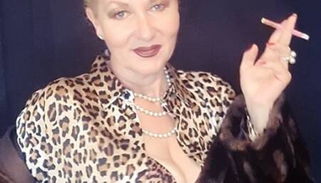 Seductive sexy intense smoke of a sobranie in fur, leopard print blouse, leather skirt and stockings*Sobranie*OMIs*dark lips