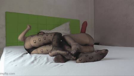 rubbing nylon stockings between two girls