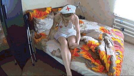 Amputated nurse in pantyhose walks on crutches 3