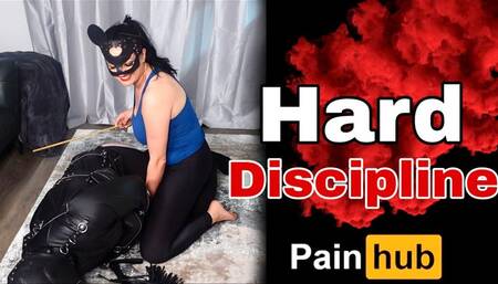 Hard Discipline - Ballbusting, Spanking, Caning in Straight Jacket