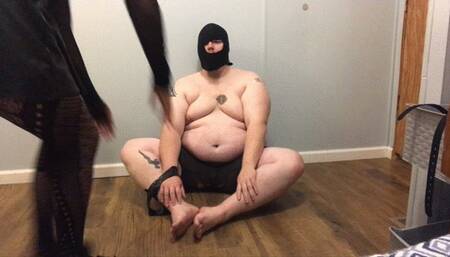 Throwing freezing cold water on tied up sub