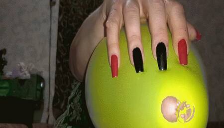Red and black nails against balloons MP4(1280*720)HD