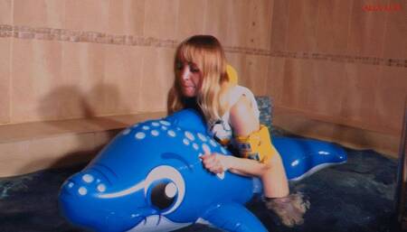 Alla rides on a tightly inflated inflatable whale in the pool and fucks him hot and wears an inflatable vest and inflatable bandages on her arms !!!