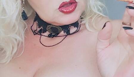 Close up thrilling seductive "tits jiggle" chain smoke with 2 Marlboro Red 100, once with and once filterless in a provocative red corset