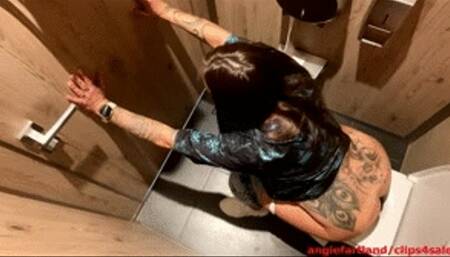 Uncorking in a public toilet