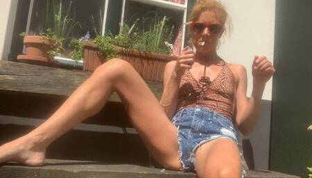 Smoke in jeans shorts