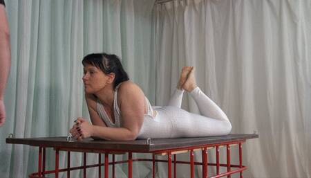 Suspension in white catsuit