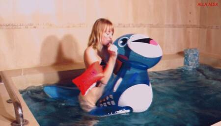 Alla gets fucked hot with an inflatable transparent seal in the pool and gets a real orgasm!!!