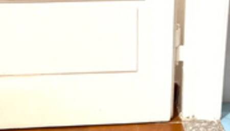 Dasha is cleaning dirty floor on her hands and on her keens she is wearing a pair of black stiletto sandals, a sexy mini dress and a thong