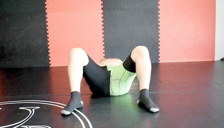 Facesitting and Ballbusting in a pink knitted bikini