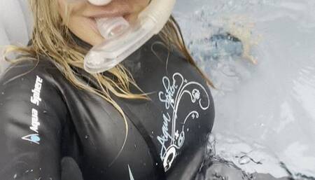 flirty in wetsuit and snorkel in hot tub