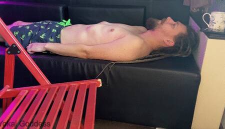 Human ashtray and footplay close to the camera