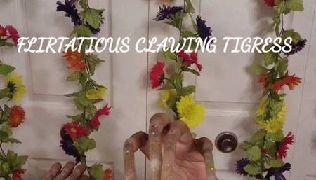 FLIRTATIOUS CLAWING TIGRESS