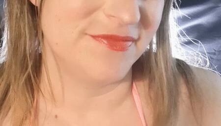 Bright make up and smoking in a fluffy bikini top