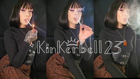 Chain-smoking two all White, slim cigarettes